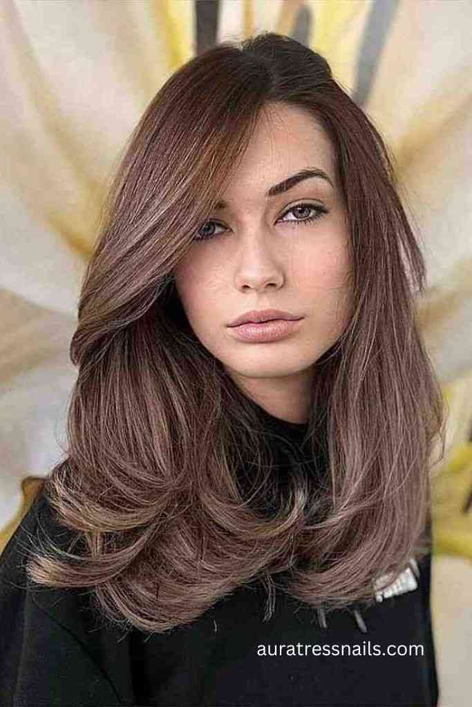 Pin-Straight Hair with a Deep Side Part