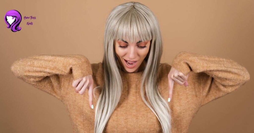 Layered shag hairstyle inspired by the 1970s, styled with textured waves and curtain bangs