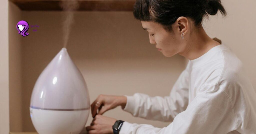 Portable humidifier adding moisture to dry indoor air for hair health