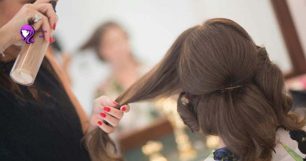 Heat protectant spray applied to hair before styling tools