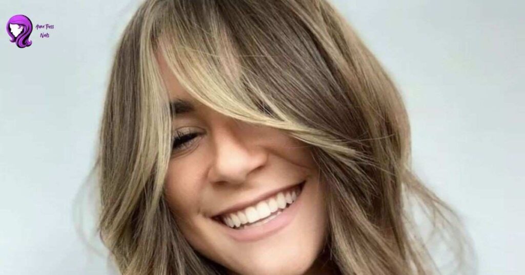 Woman with a sleek, polished Gypsy Shag cut styled for a professional work environment