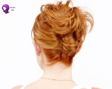 An elegant French twist hairstyle perfect for formal occasions, styled on medium-length hair.