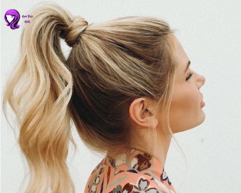 A sleek high ponytail with wrapped base, giving a chic and polished finish.